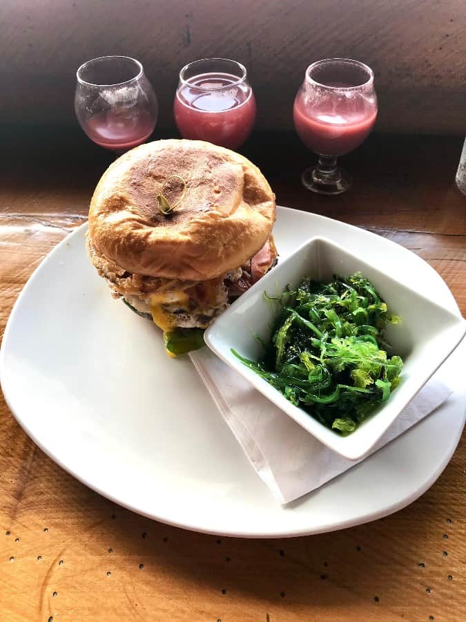 burger seaweed salad and three sample size beers from Dewey Beer Co