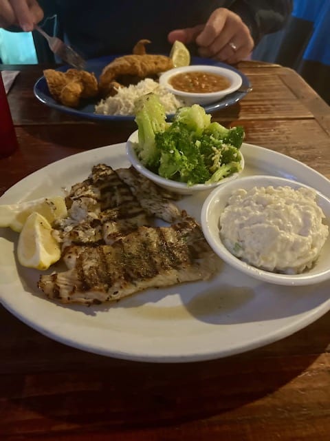 Fresh caught fish prepared with two sides at SS Wreck