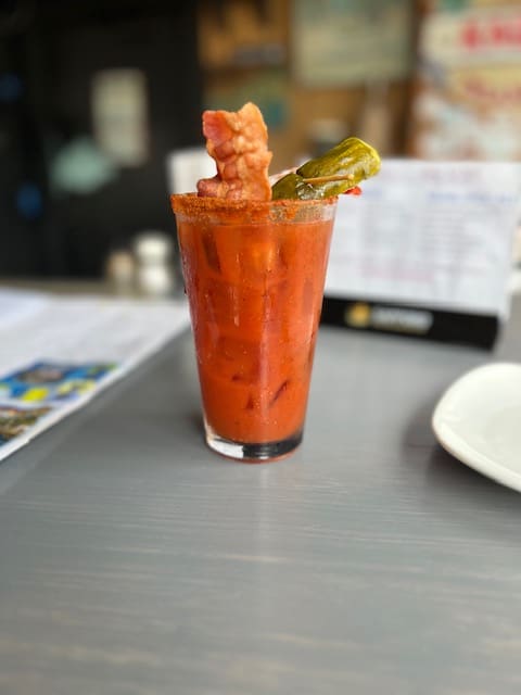 A bloody mary with all the toppings.
