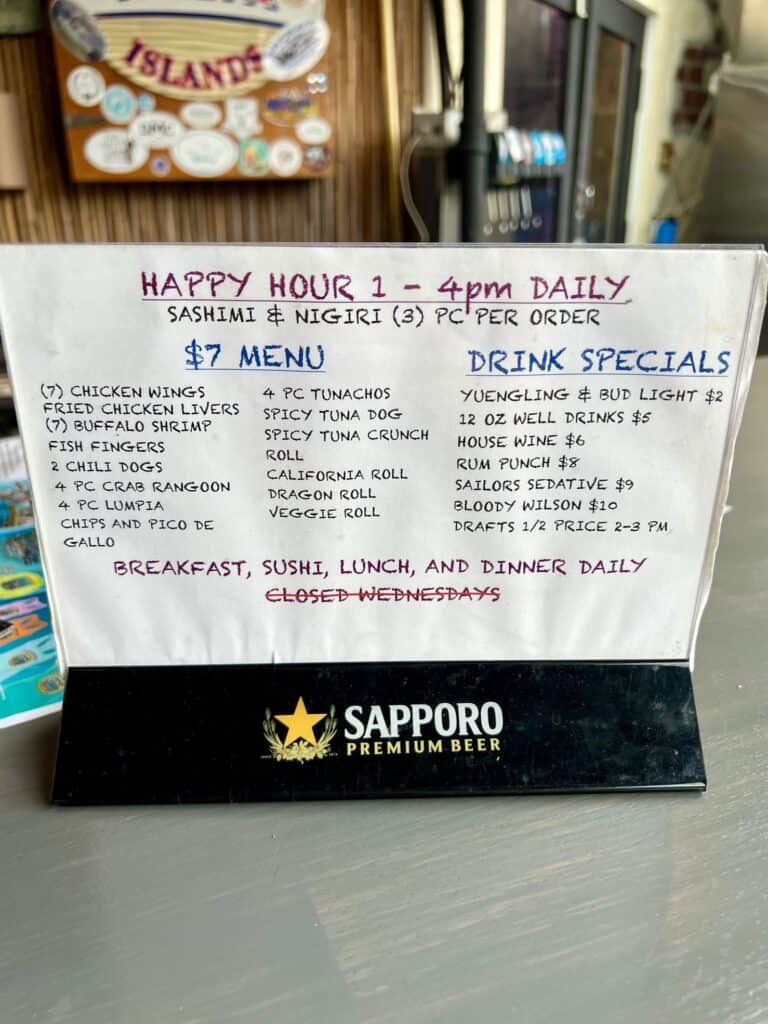 Image of the happy hour menu at Castaway Waterfront Restaurant and Sushi Bar