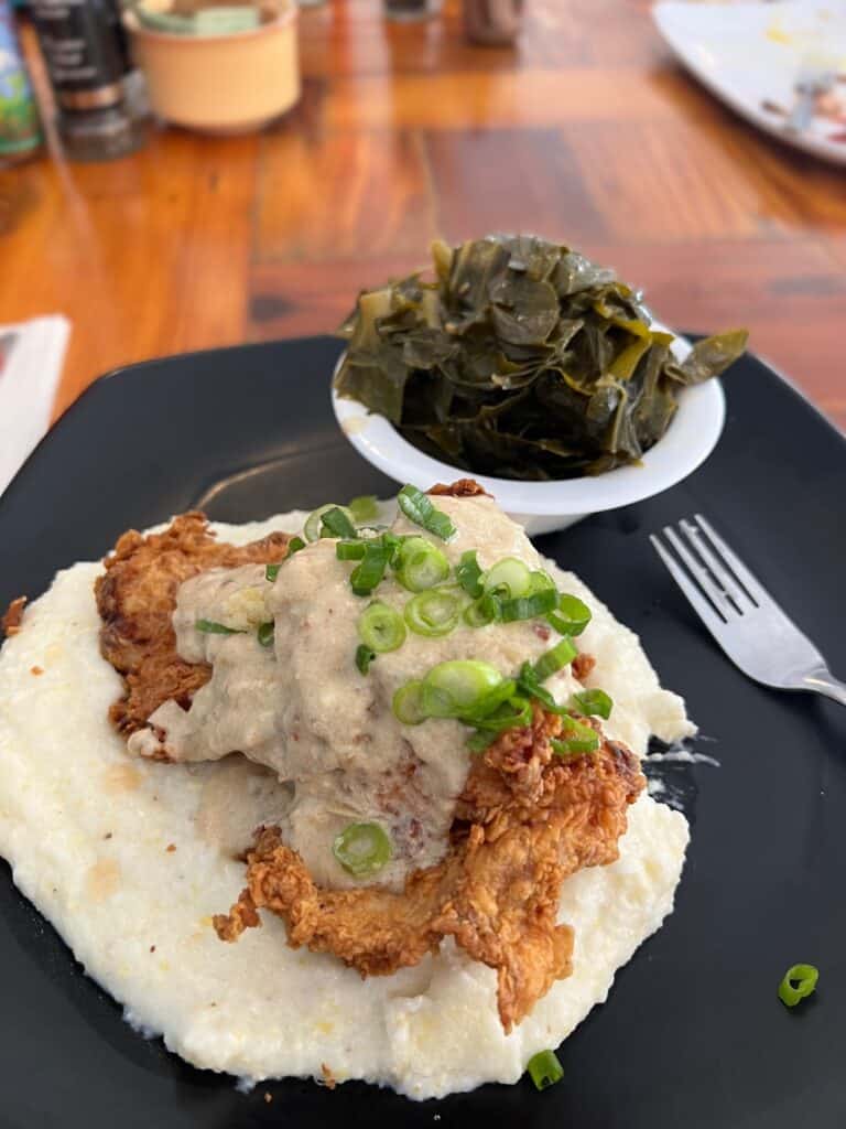 chicken and biscuits with collard greens at at the blue hen