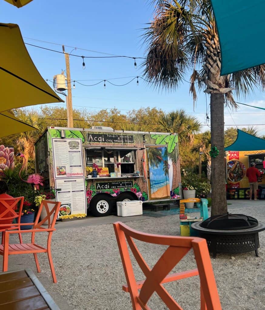 colorful food truck and chairs and palm trees in St Augustine