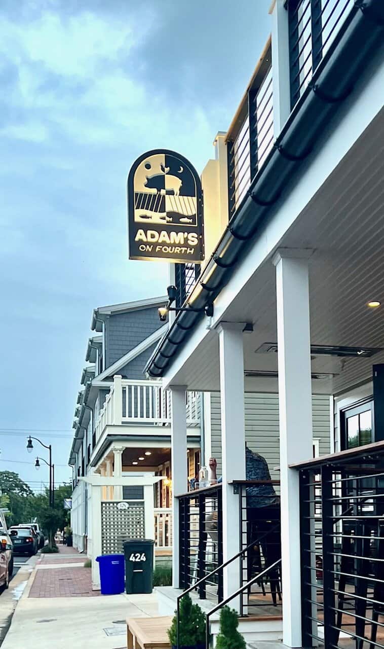 Exterior porch and sign outside Adam's on Fourth in Annapolis