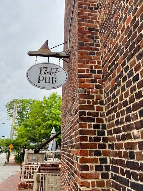 Sign outside of the 1747 Pub a historic bar in Maryland