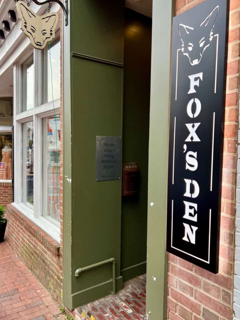 Outside door entrance to the Fox's Den a wood fired pizza spot and bar in Annapolis MD