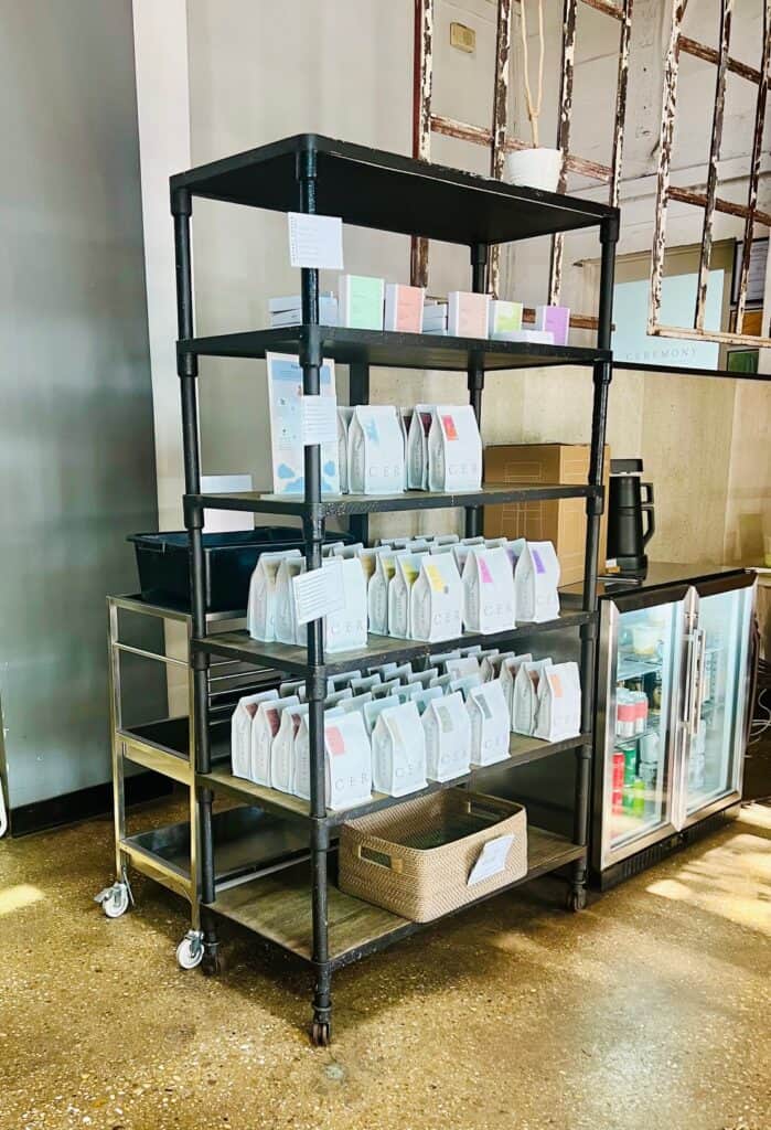 Freshly ground coffee bags on a shelf