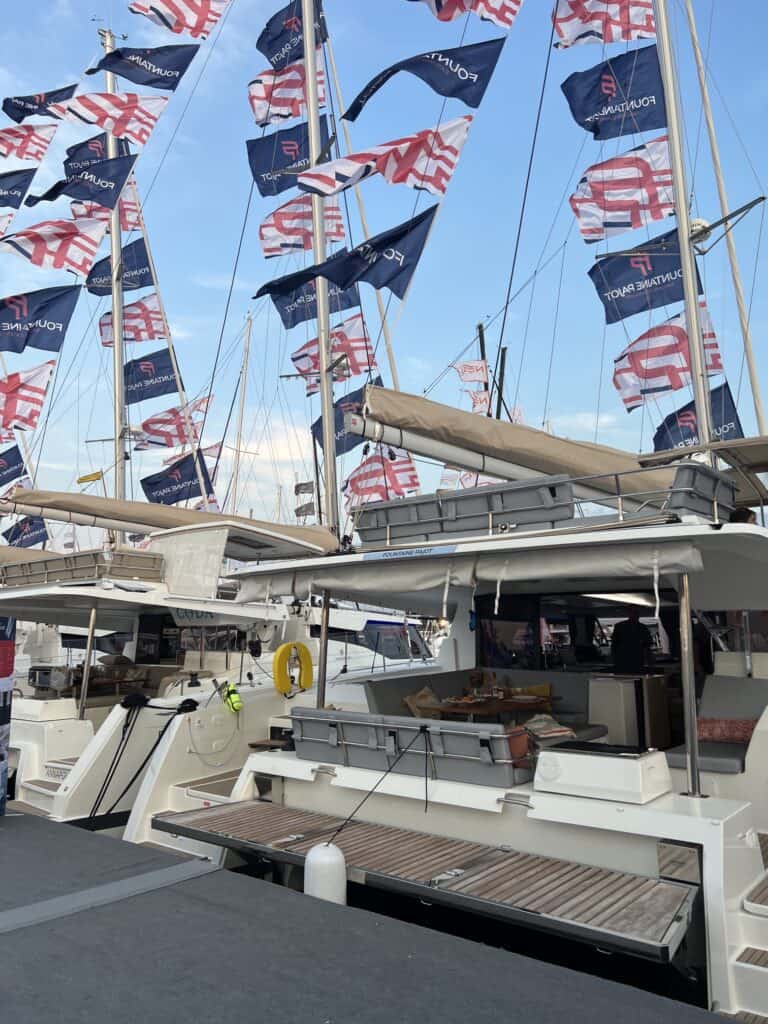 Large catamarans with flags at the Annapolis Boat Show